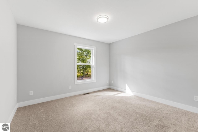 empty room with carpet floors