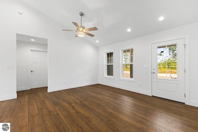 unfurnished living room with dark hardwood / wood-style flooring, ceiling fan, and lofted ceiling