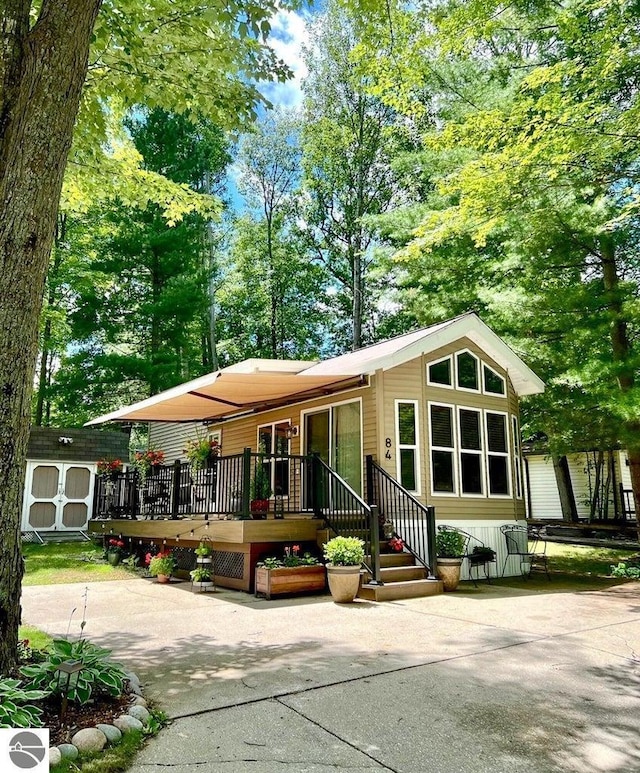 view of front of house featuring a deck