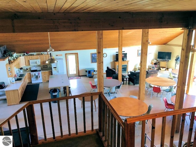 stairway with wood ceiling and sink