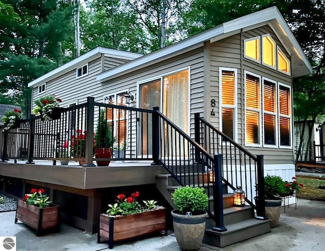 rear view of house with a deck