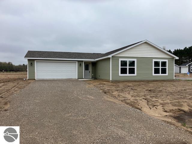 ranch-style home with a garage