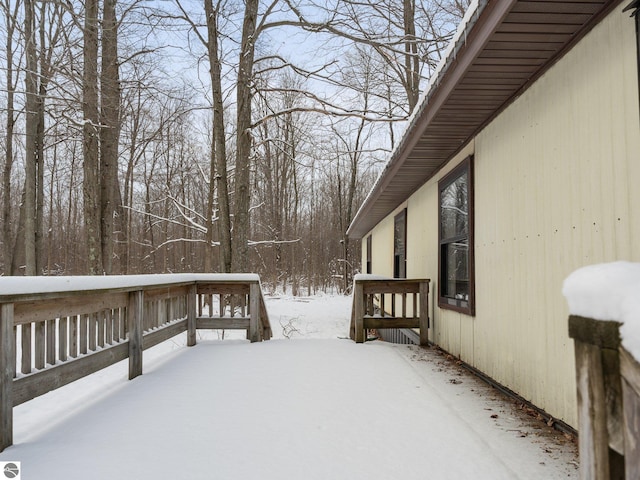 view of snow covered deck