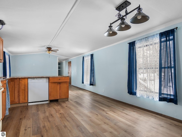 kitchen with dishwasher, hanging light fixtures, and ornamental molding