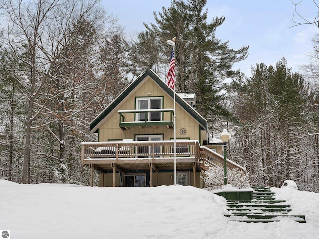 view of snow covered house