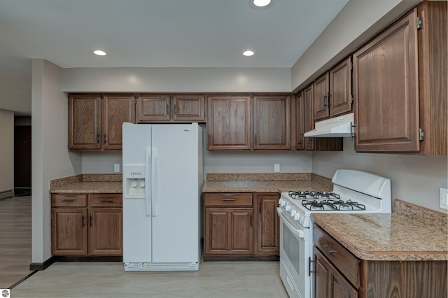 kitchen featuring white appliances