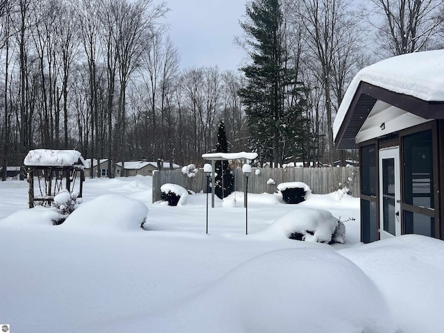 view of yard covered in snow