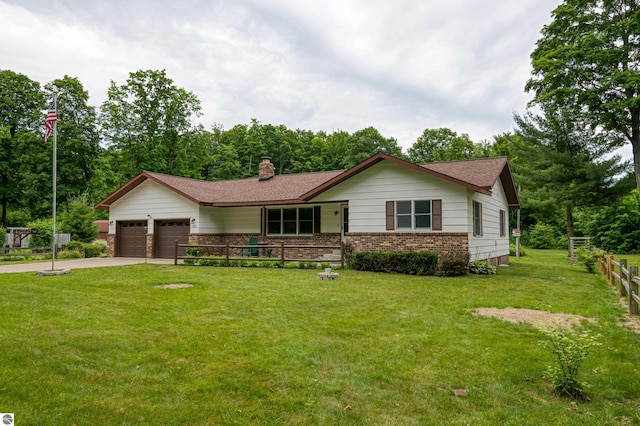 ranch-style house with a front yard and a garage