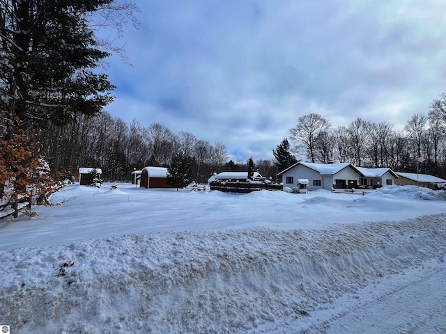 view of yard covered in snow