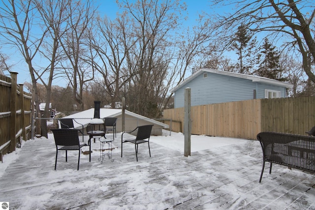 view of snow covered patio