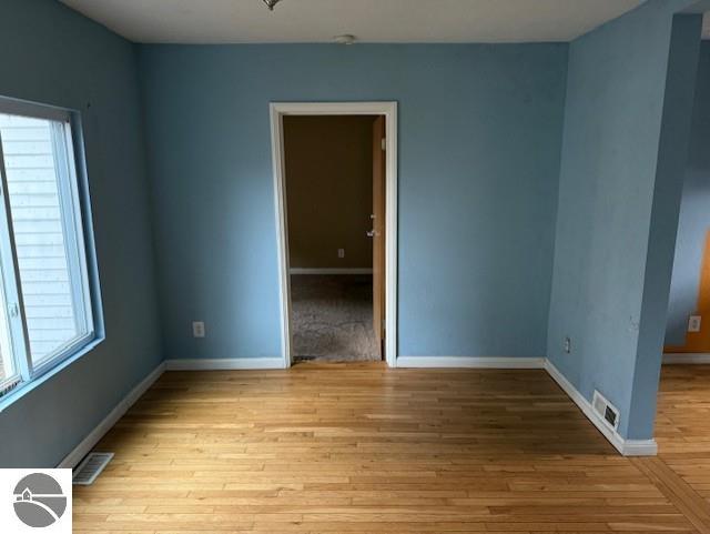 empty room featuring light hardwood / wood-style floors