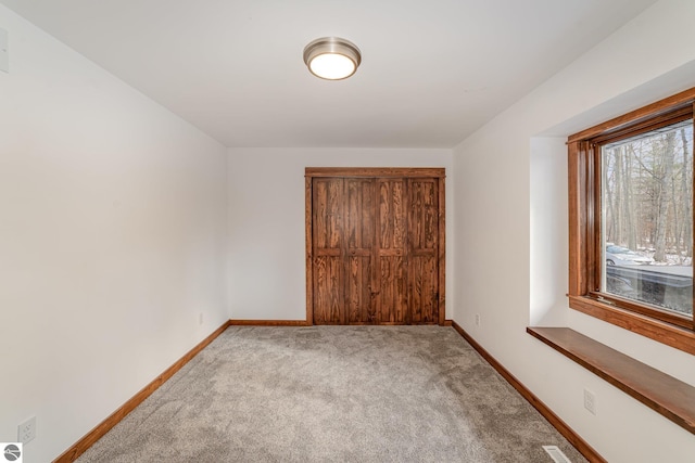 view of carpeted spare room