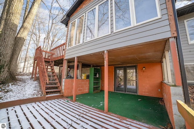 view of snow covered deck