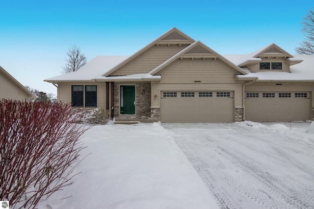 craftsman-style home featuring a garage