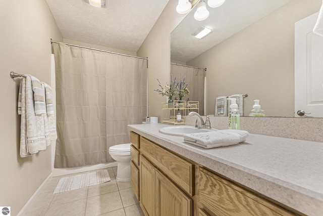 bathroom with tile patterned floors, a shower with curtain, vanity, a textured ceiling, and toilet