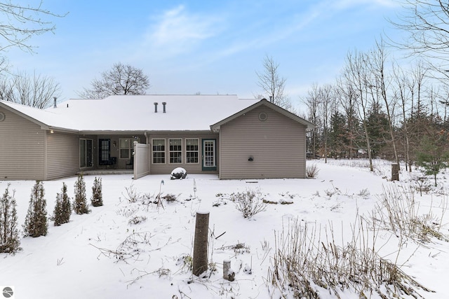 view of snow covered house