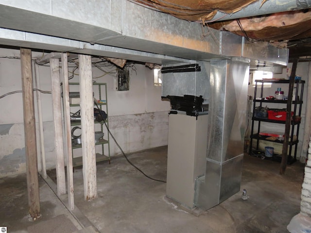 basement featuring heating unit