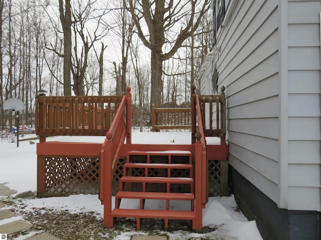 view of snow covered deck