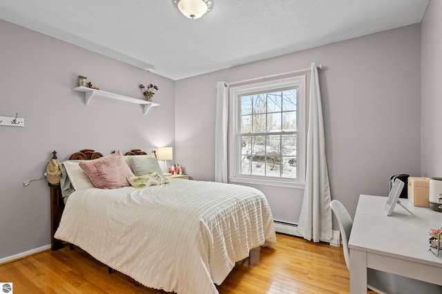 bedroom featuring light hardwood / wood-style flooring