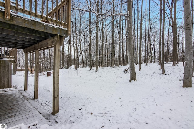 view of yard layered in snow