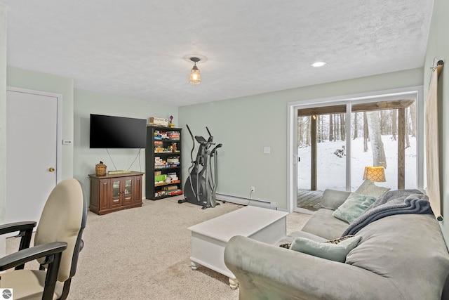 living room featuring a textured ceiling, a baseboard radiator, and light colored carpet