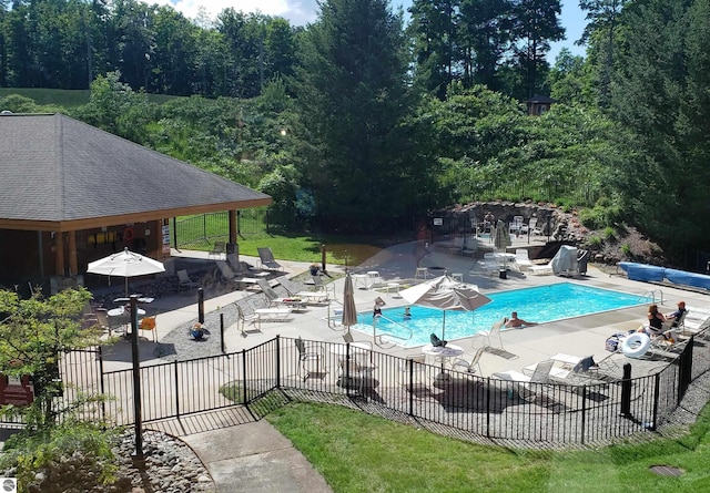 view of swimming pool featuring a patio