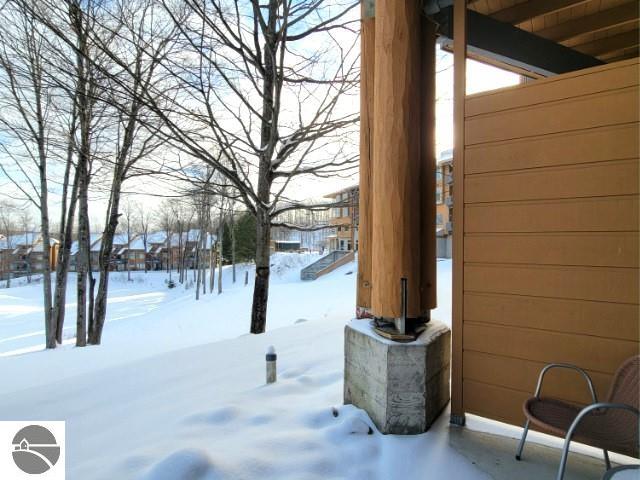 view of yard covered in snow