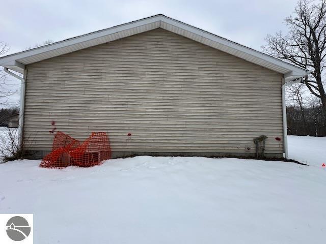 view of snow covered property