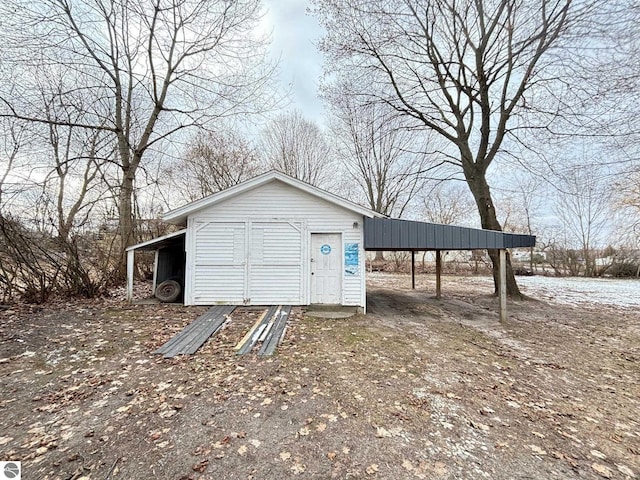 view of outdoor structure with a carport