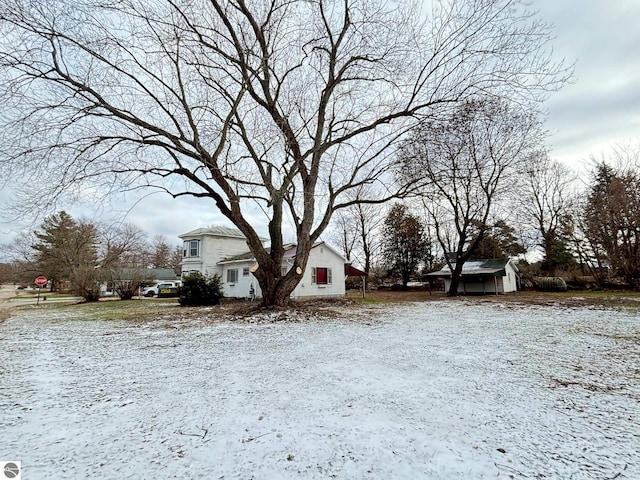 view of yard covered in snow