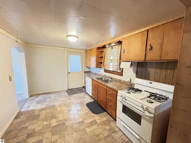 kitchen featuring white appliances and sink