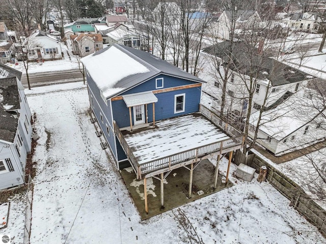 view of snow covered property