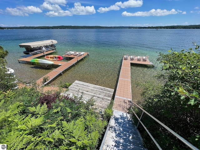 dock area featuring a water view