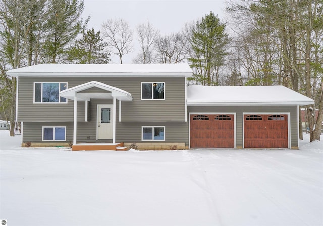 split foyer home featuring a garage