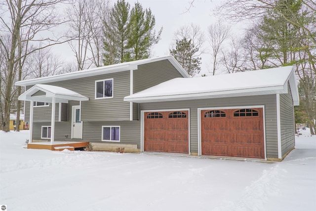 bi-level home featuring a garage