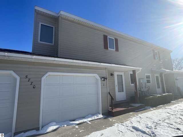 view of front of property with a garage