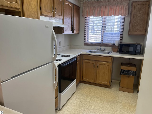 kitchen with white appliances and sink