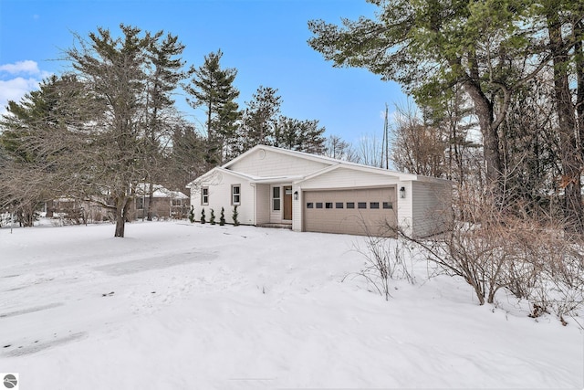 view of front of property featuring a garage