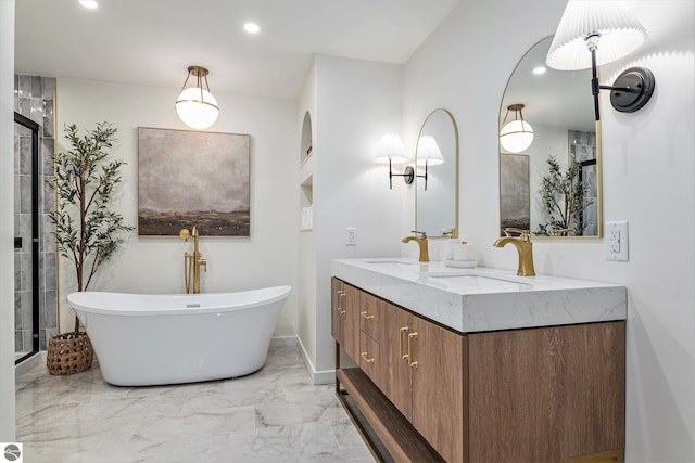 bathroom with a bathing tub and vanity