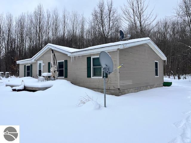 view of snow covered property