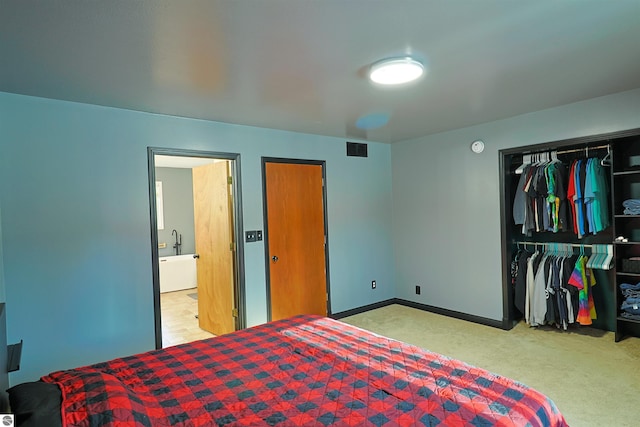 bedroom with light colored carpet