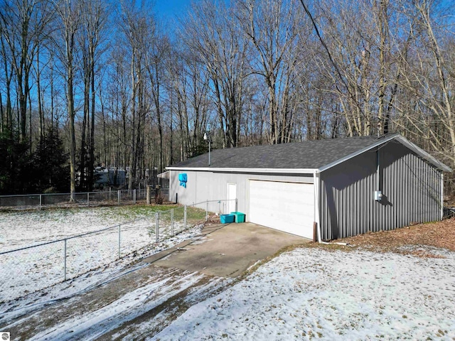 view of snow covered garage