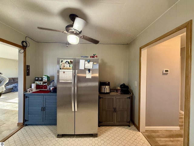 kitchen featuring stainless steel fridge and ceiling fan