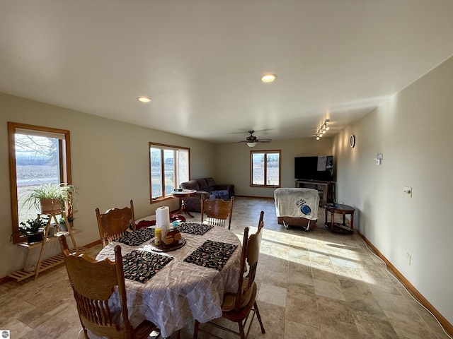 dining room featuring ceiling fan