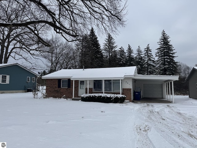 single story home featuring a carport