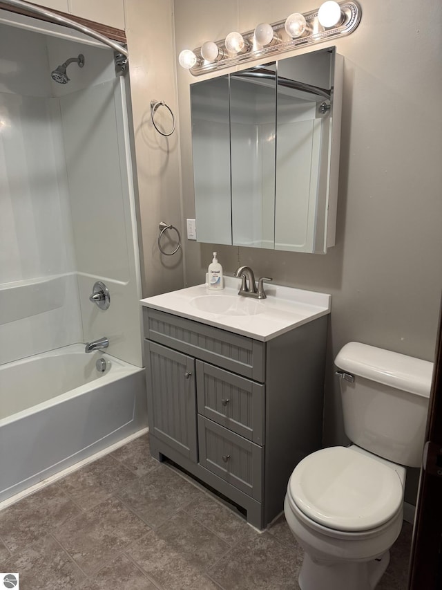 full bathroom with vanity, toilet, and washtub / shower combination