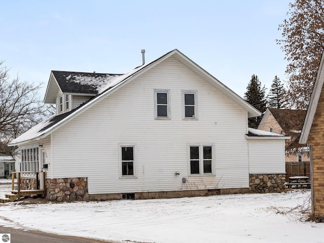 view of snow covered property