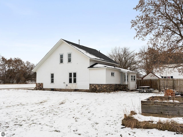 view of snow covered property