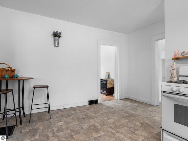 kitchen with white gas stove