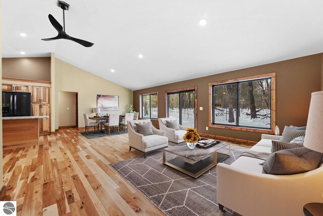 108 Rolling Oak Ln, Roscommon, MI 48653 - living room featuring lofted ceiling, recessed lighting, light wood-style floors, and a ceiling fan
